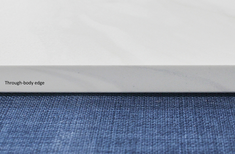 Through-body sintered stone