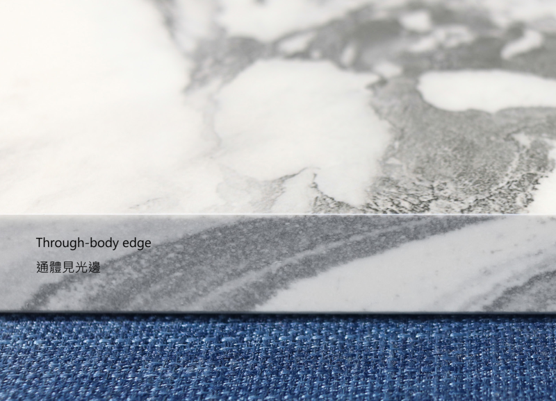 Through-body sintered stone