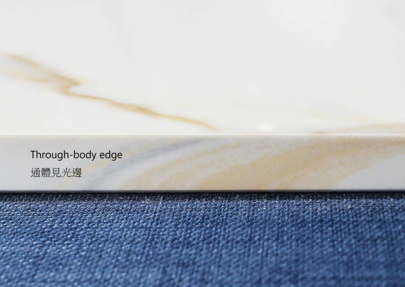 Through-body sintered stone